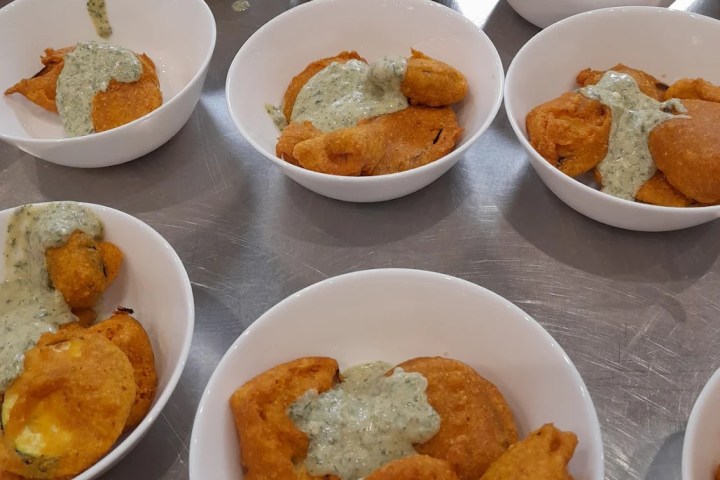 a bowl filled with different types of food on a table