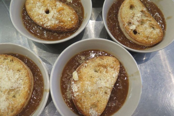 a bowl filled with different types of food on a plate