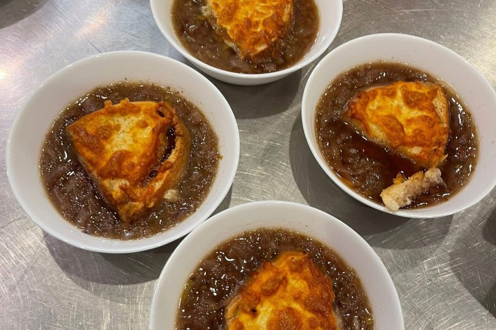 a bowl filled with different types of food on a table