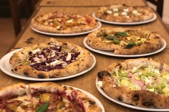 a table topped with plates of food on a plate