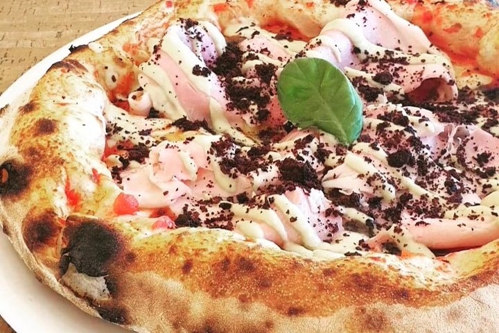 a slice of pizza on a plate