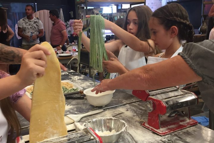 Aurore Gagnon et al. playing instruments and performing on a counter