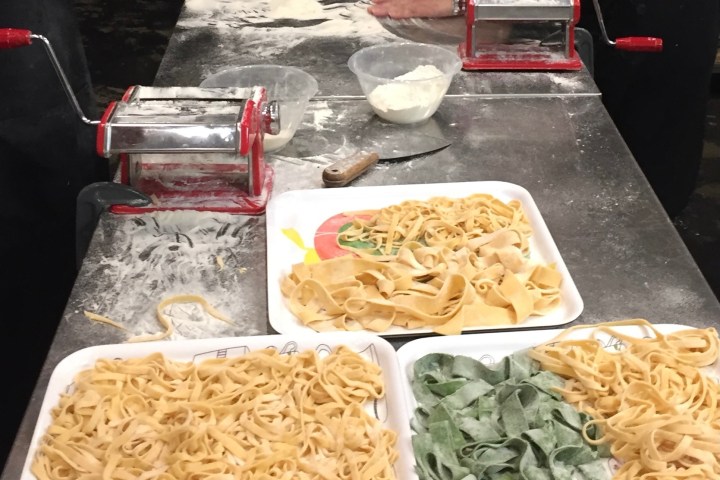 a person sitting at a table with food