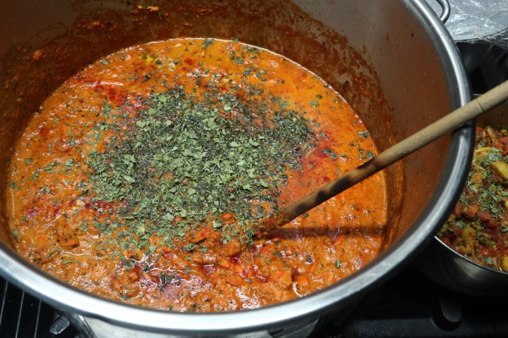a bowl of food on a metal pan