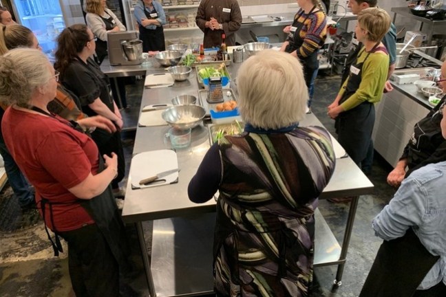 a group of people sitting at a table