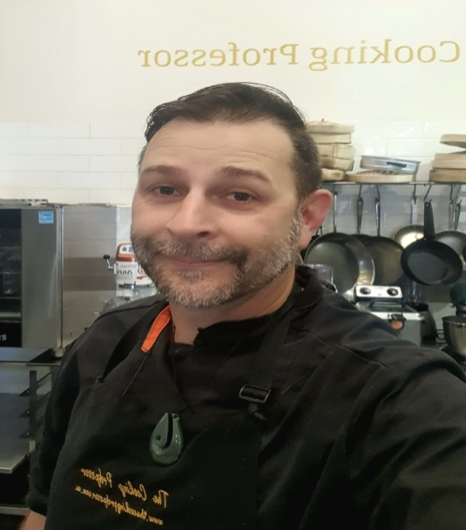 a man smiling for the camera