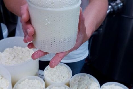 a man holding a plate of food