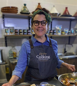 a person standing in front of a plate of food