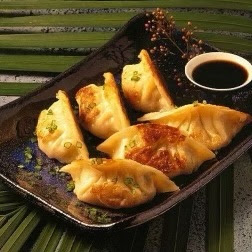 Chinese Dumplings Class a plate of food and a cup of coffee