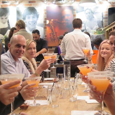 a group of people sitting at a table