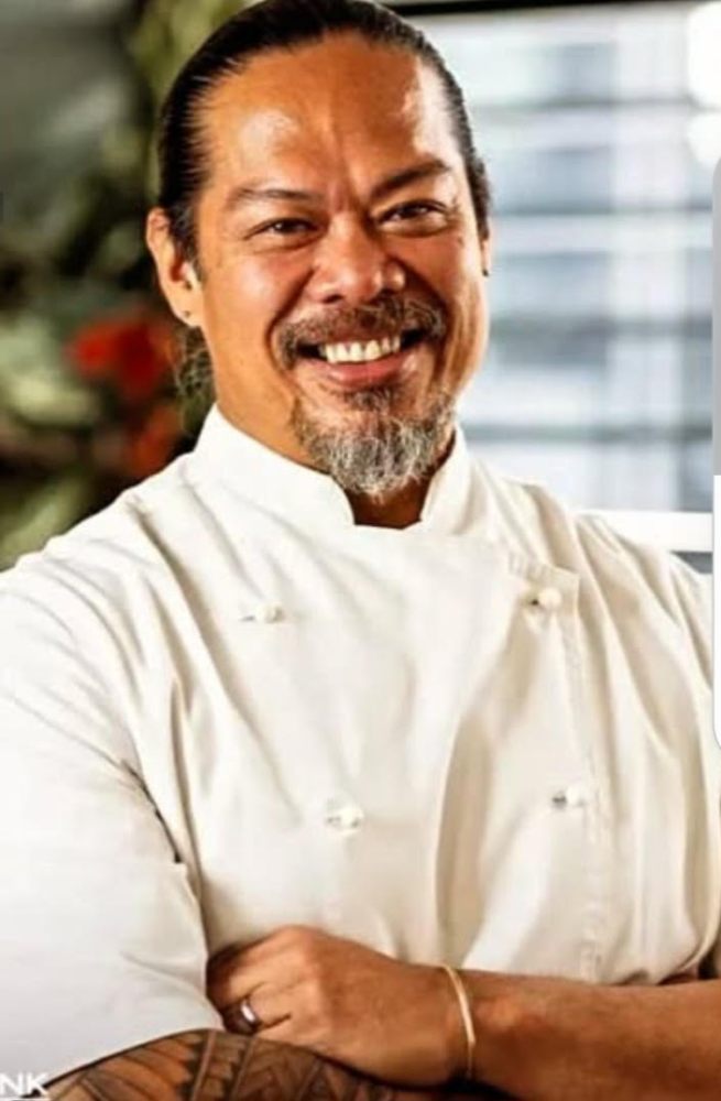 a man smiling for the camera